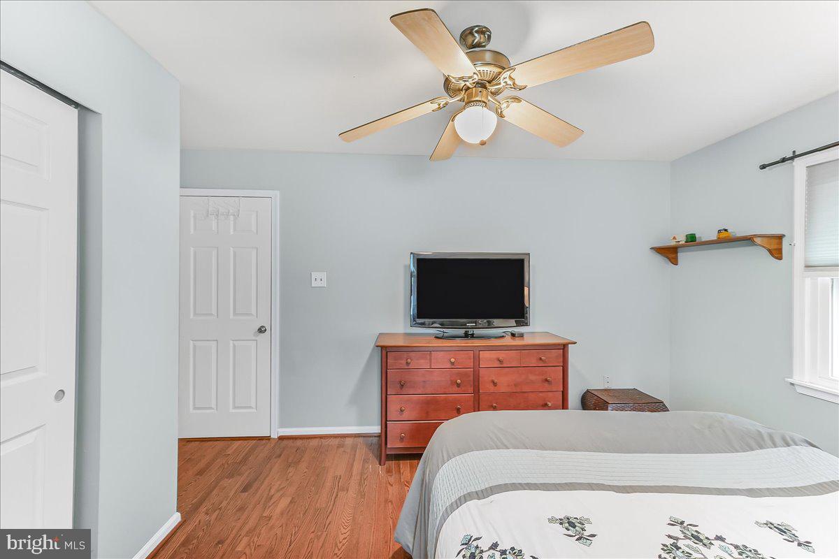 502 Ryanard Road Wallingford, PA 19086 - Photo 27 of 38 a bedroom with a bed and a flat screen tv