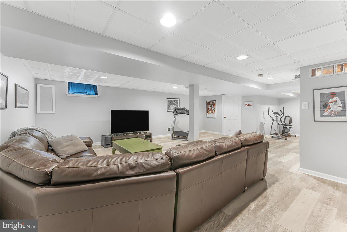 502 Ryanard Road Wallingford, PA 19086 - Photo 28 of 38 a living room with furniture and a flat screen tv