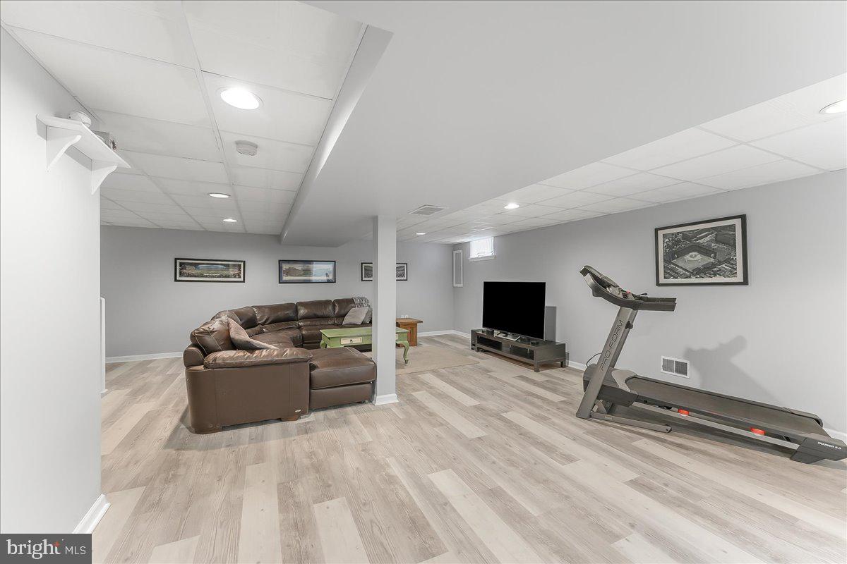 502 Ryanard Road Wallingford, PA 19086 - Photo 31 of 38 a room with furniture and a flat screen tv