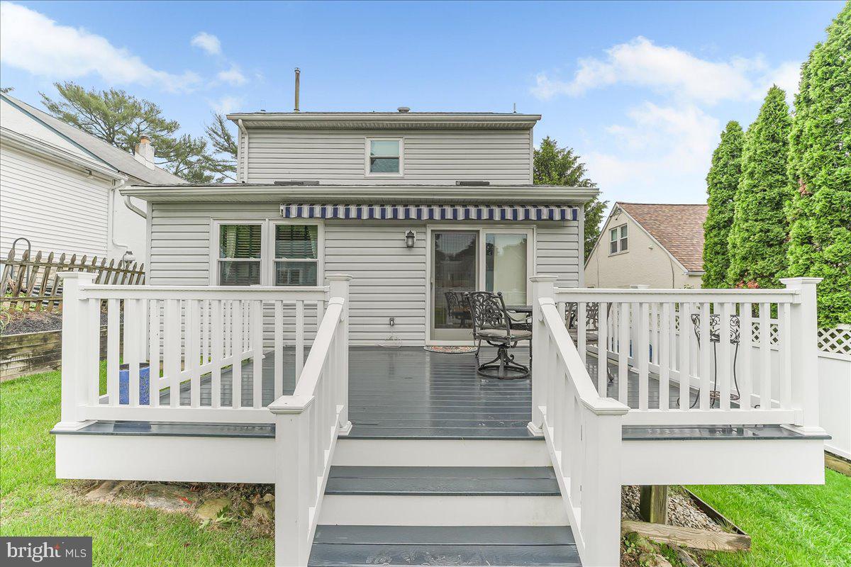 502 Ryanard Road Wallingford, PA 19086 - Photo 35 of 38 a view of a house with wooden deck and furniture