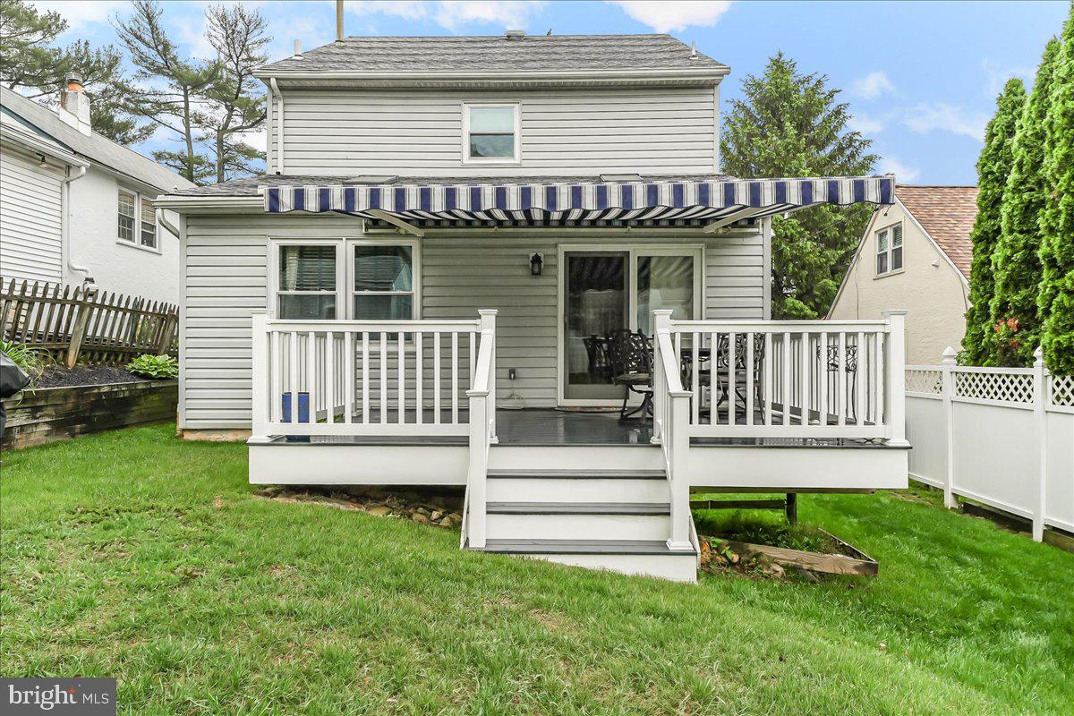 502 Ryanard Road Wallingford, PA 19086 - Photo 36 of 38 a view of a house with a yard deck and a small yard
