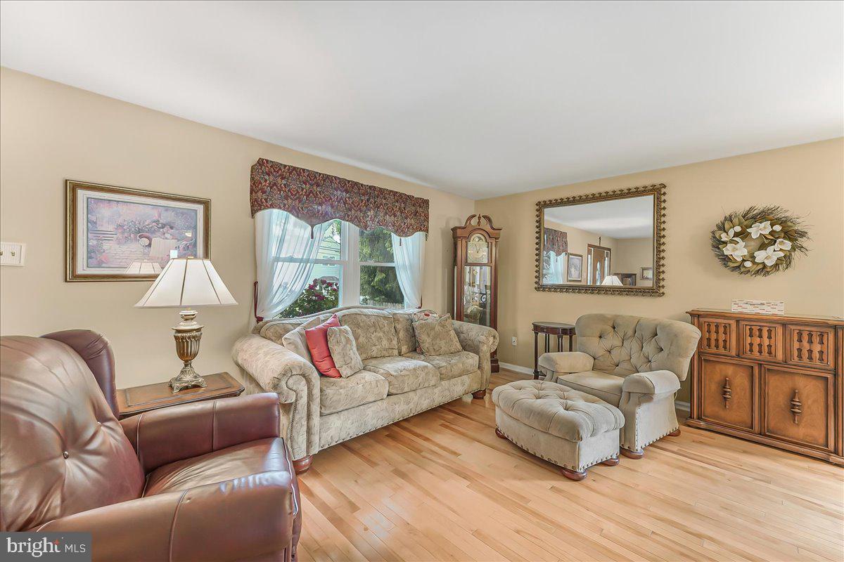 502 Ryanard Road Wallingford, PA 19086 - Photo 8 of 38 a living room with furniture and a large window