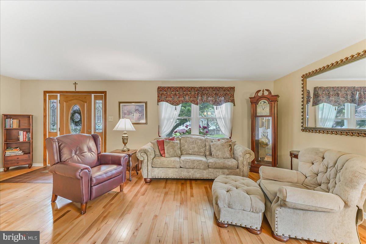 502 Ryanard Road Wallingford, PA 19086 - Photo 9 of 38 a living room with furniture and a large window