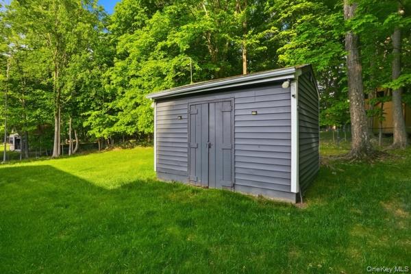 31 Laura Road Monroe, NY 10950 - Photo 38 of 39 a backyard of a house with lots of green space