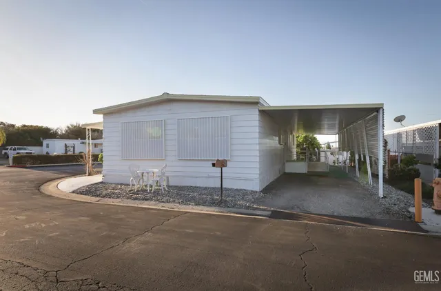 a view of a house with a street