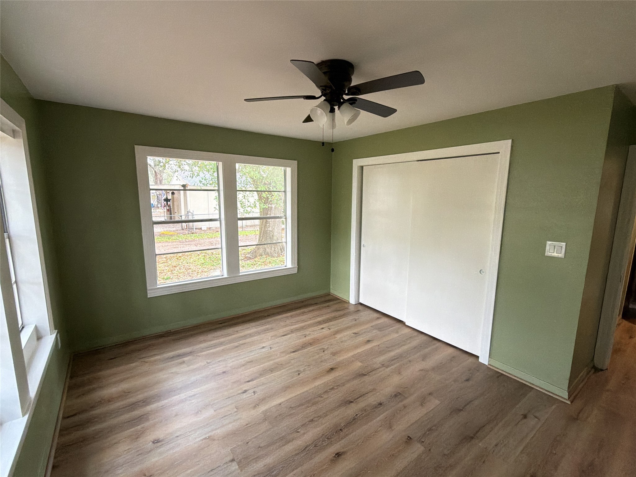 3604 Rychlik Drive Rosenberg, TX 77471 - Photo 4 of 13 a view of empty room with wooden floor and fan