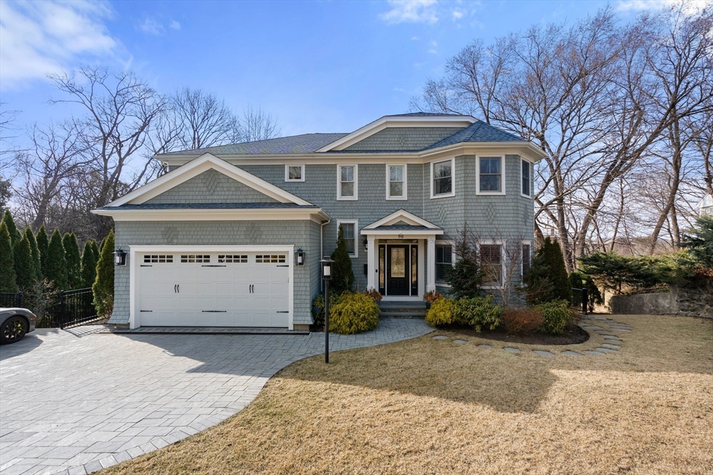96 Oldham Road Newton, MA 02465 - Photo 1 of 40 a front view of a house with garden