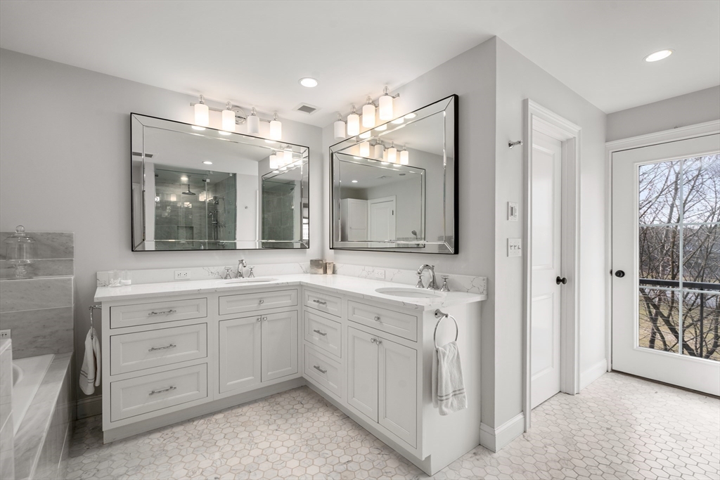 96 Oldham Road Newton, MA 02465 - Photo 13 of 40 a spacious bathroom with a double vanity sink mirror and double