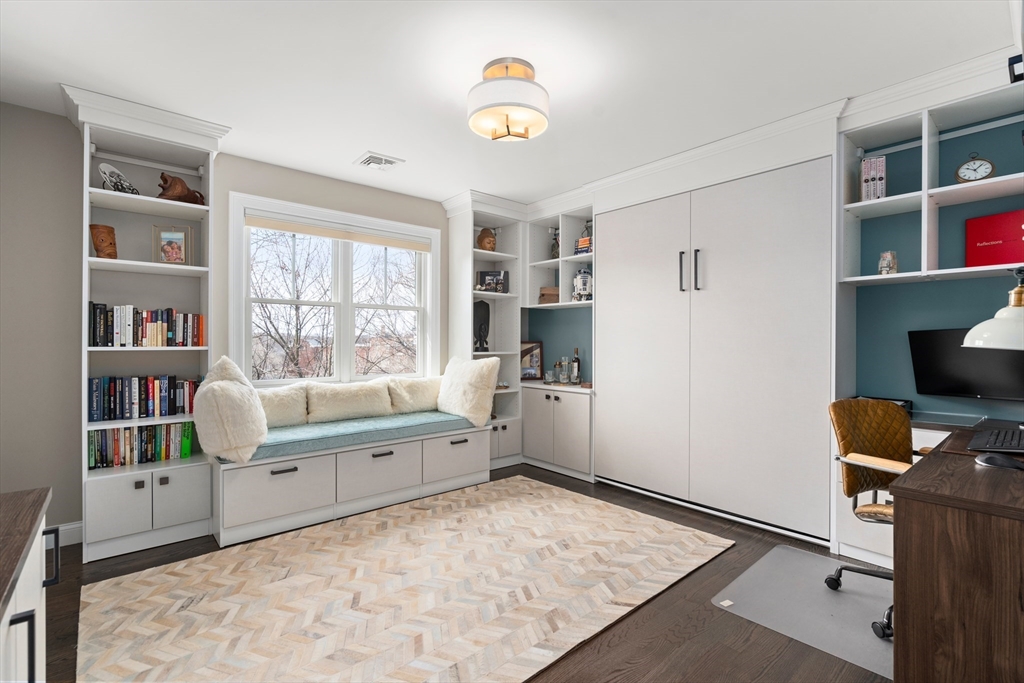 96 Oldham Road Newton, MA 02465 - Photo 16 of 40 a room with furniture and a window