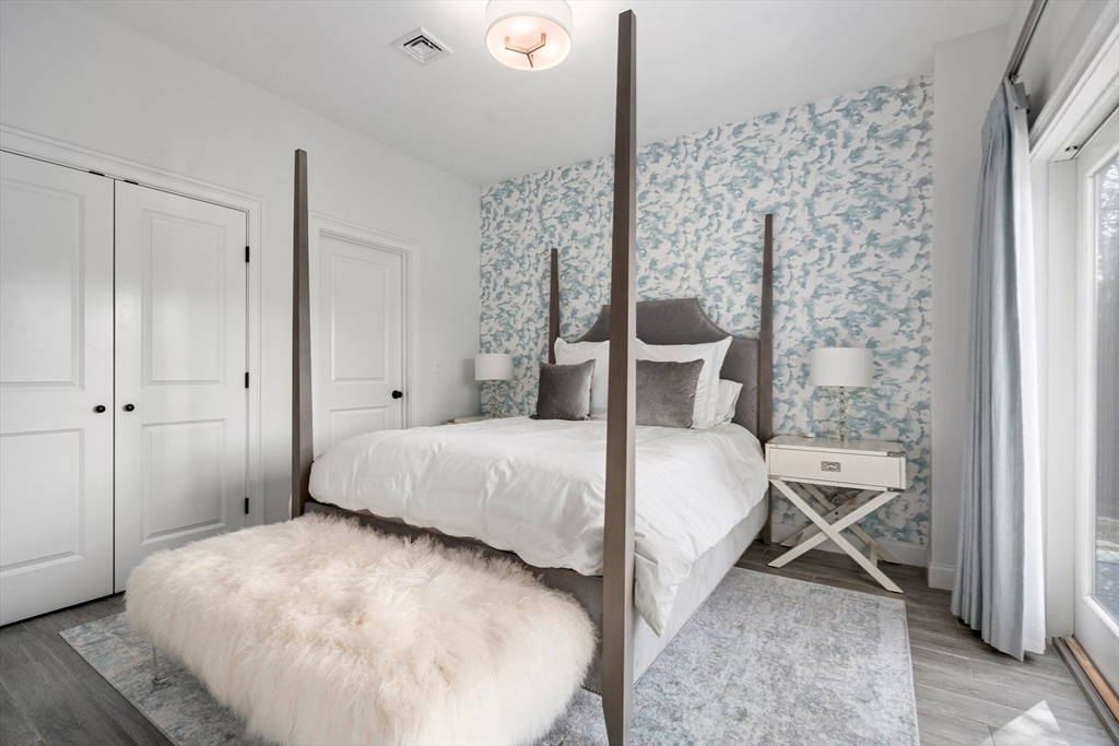 96 Oldham Road Newton, MA 02465 - Photo 25 of 40 a bedroom with a bed and a window