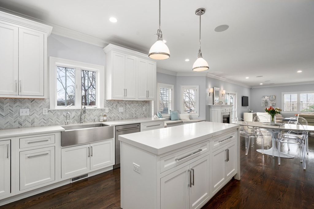 96 Oldham Road Newton, MA 02465 - Photo 3 of 40 a large white kitchen with lots of counter space sink and appliances