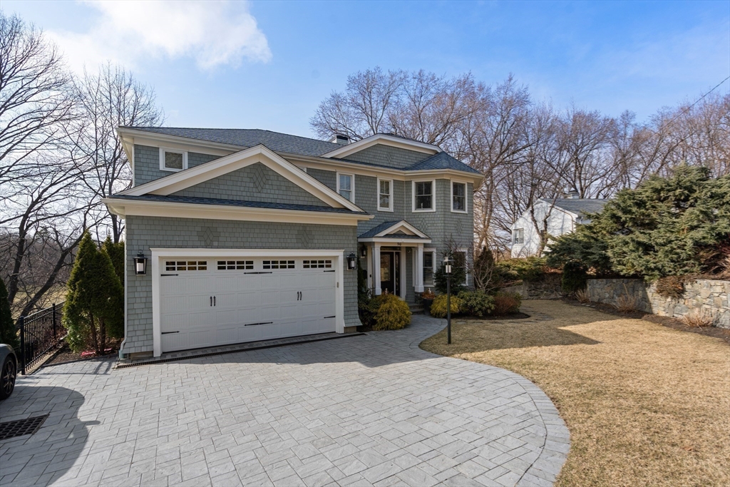 96 Oldham Road Newton, MA 02465 - Photo 38 of 40 a front view of a house with a yard