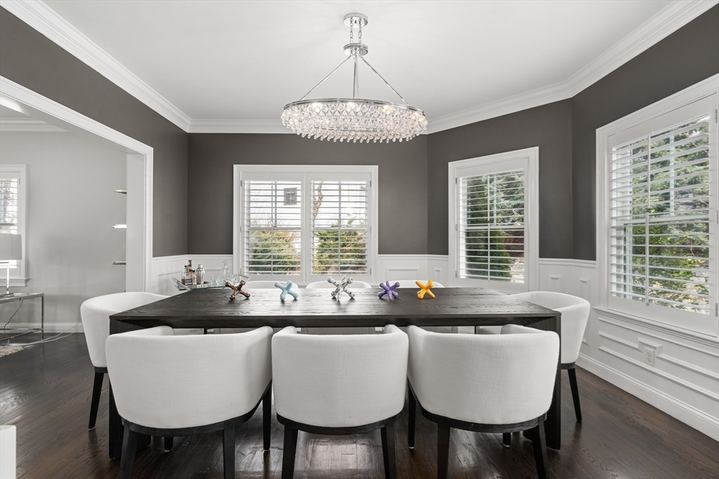 96 Oldham Road Newton, MA 02465 - Photo 9 of 40 a dining room with furniture a chandelier and window