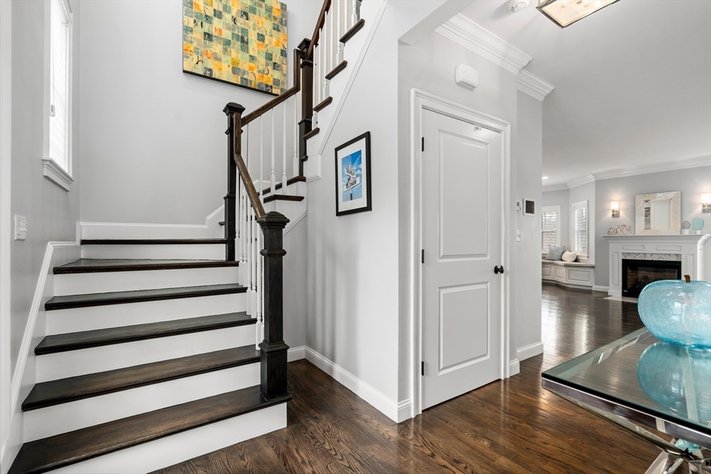 96 Oldham Road Newton, MA 02465 - Photo 10 of 40 a view of entryway and hall with wooden floor