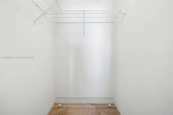 a view of a room with racks on the wall