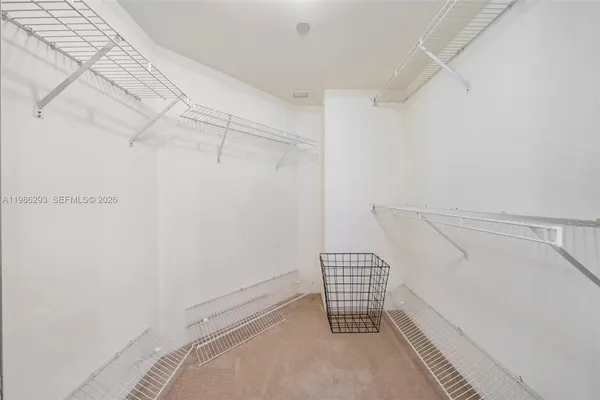 a view of a room with racks on the wall