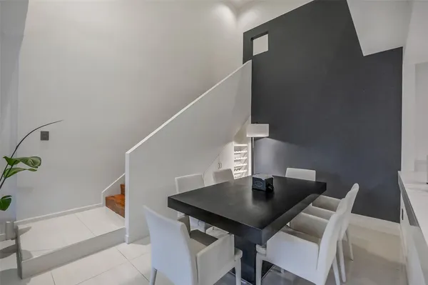 a view of a workspace with furniture