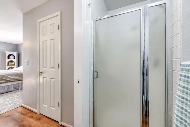 a view of a bathroom from the hallway