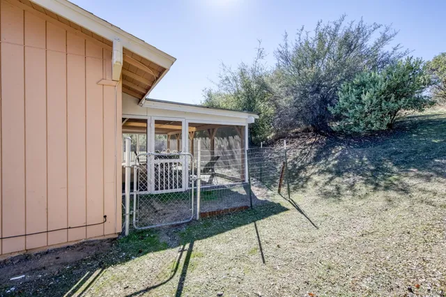 a house view with a backyard space