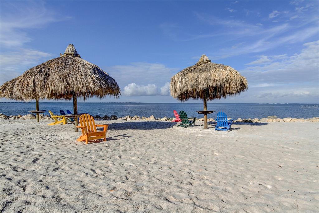 2506 North Rocky Point Drive, Unit 457 Tampa, FL 33607 - Photo 13 of 24 a backyard of a house with table and chairs