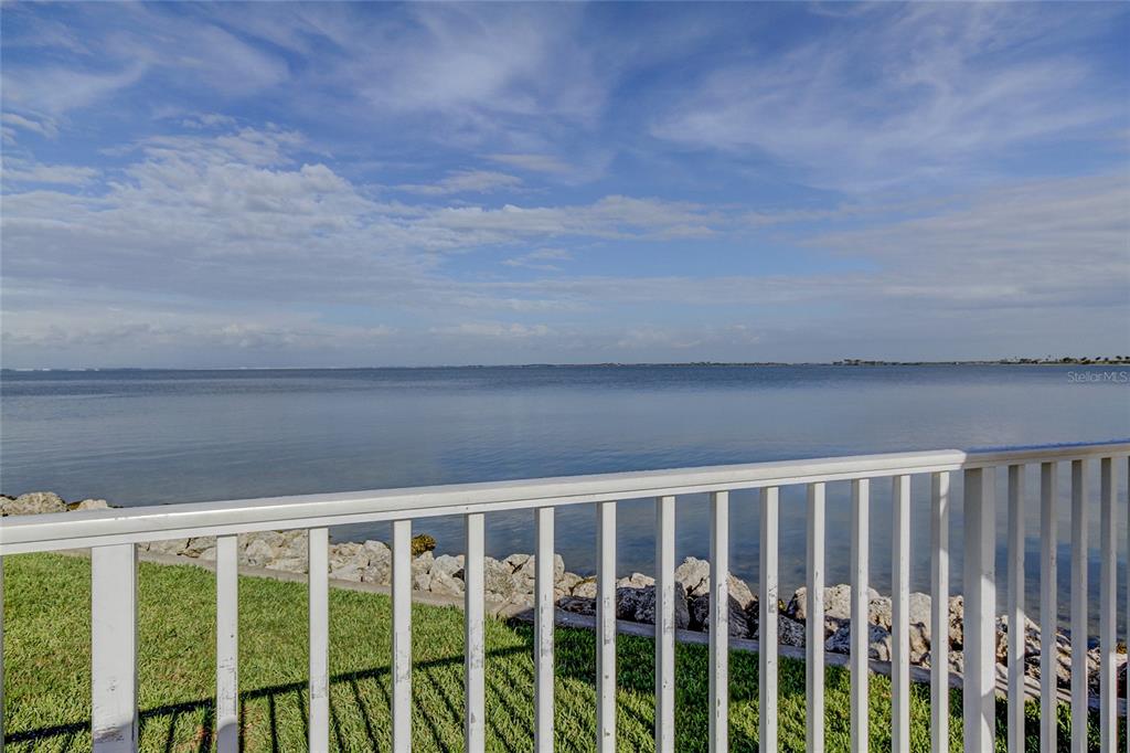 2506 North Rocky Point Drive, Unit 457 Tampa, FL 33607 - Photo 18 of 24 a view of a balcony with wooden floor