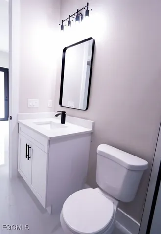 a bathroom with a double vanity sink