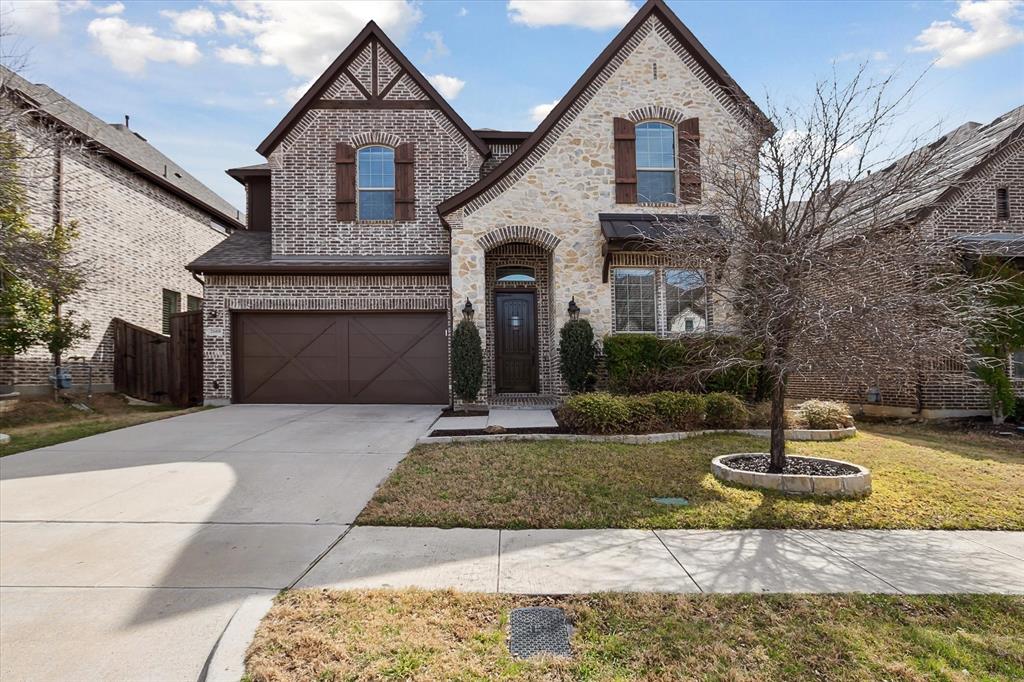 2608 Navarro Trail Euless, TX 76039 - Photo 1 of 1 a front view of a house with a yard and garage