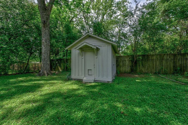 4708 Chip Road Memphis, TN 38117 - Photo 9 of 21 View of outdoor structure featuring a yard
