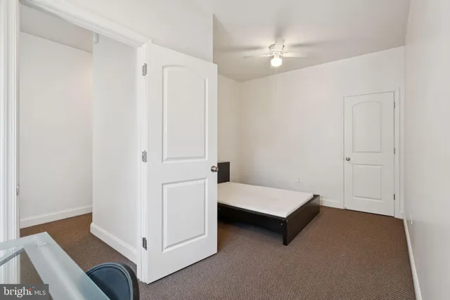 a view of a hallway with workspace