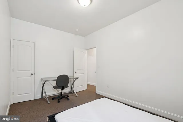 a room with a chair and a table