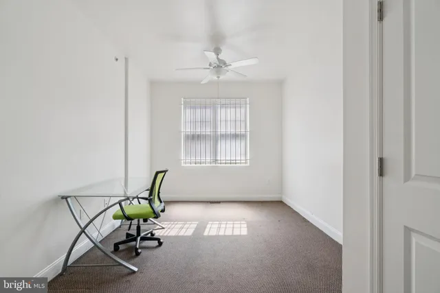 a picture of a room with a floor to ceiling window