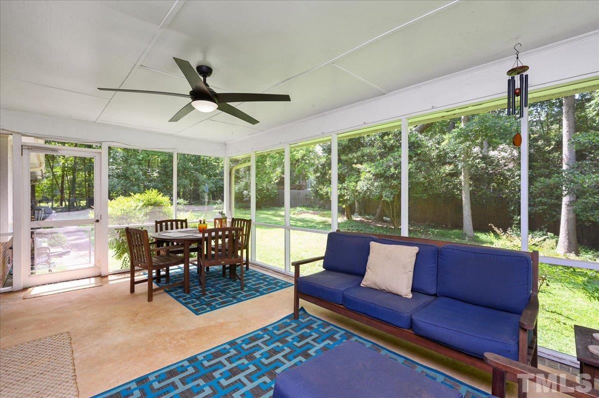 8824 Oneal Road Raleigh, NC 27613 - Photo 33 of 33 a living room with furniture and a large window