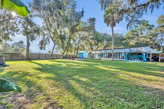 a view of outdoor space yard and swimming pool