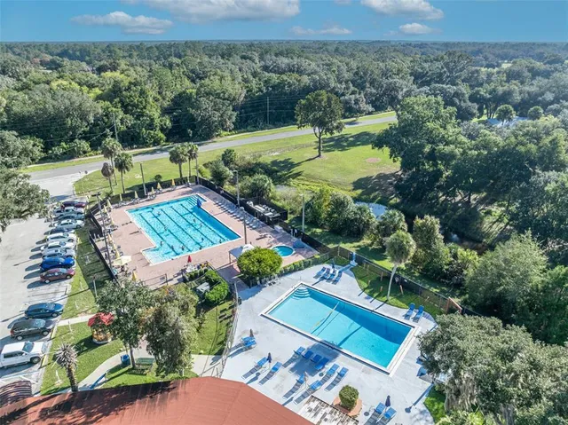 an aerial view of a house with a garden