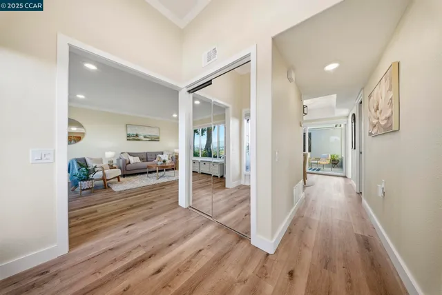 a living room with furniture and a rug