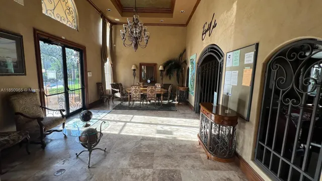 a view of entryway and hall with dining area