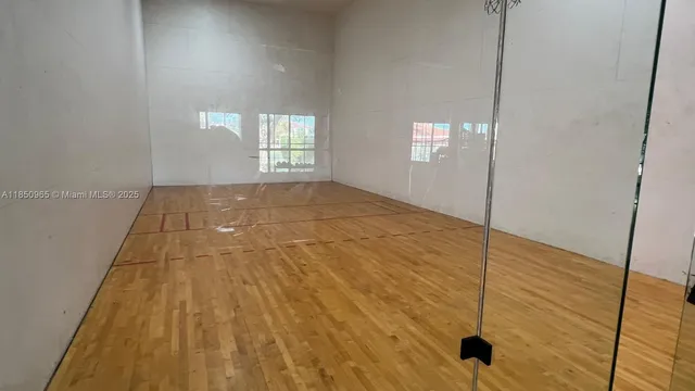 a view of empty room with windows