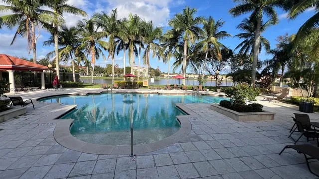 a view of outdoor space with palm trees