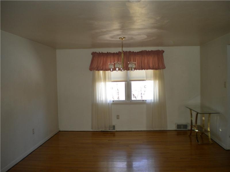 1027 Harvard Road Monroeville, PA 15146 - Photo 5 of 9 Dining Room. LARGE DINING ROOM WITH HARDWOOD FLOORS, OPEN TO THE LIVING ROOM