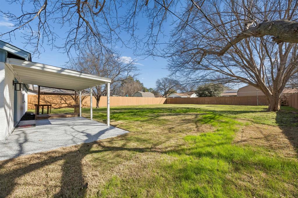 312 East Hampton Road Crowley, TX 76036 - Photo 20 of 22 a view of a backyard