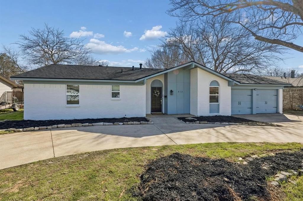 312 East Hampton Road Crowley, TX 76036 - Photo 5 of 22 a view of a house with a yard