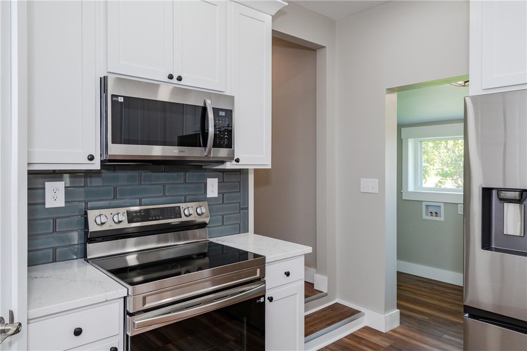 1217 Jasper Road Xenia, OH 45385 - Photo 25 of 62 This kitchen features stainless steel appliances and a stylish subway tile backsplash.