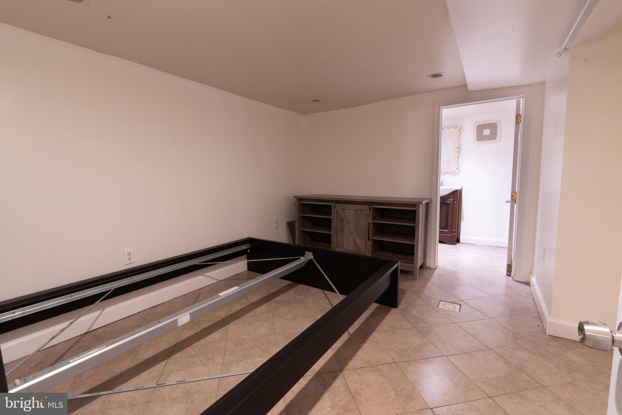 3618 Emerald Street Philadelphia, PA 19134 - Photo 20 of 34 a view of an empty room and fire place