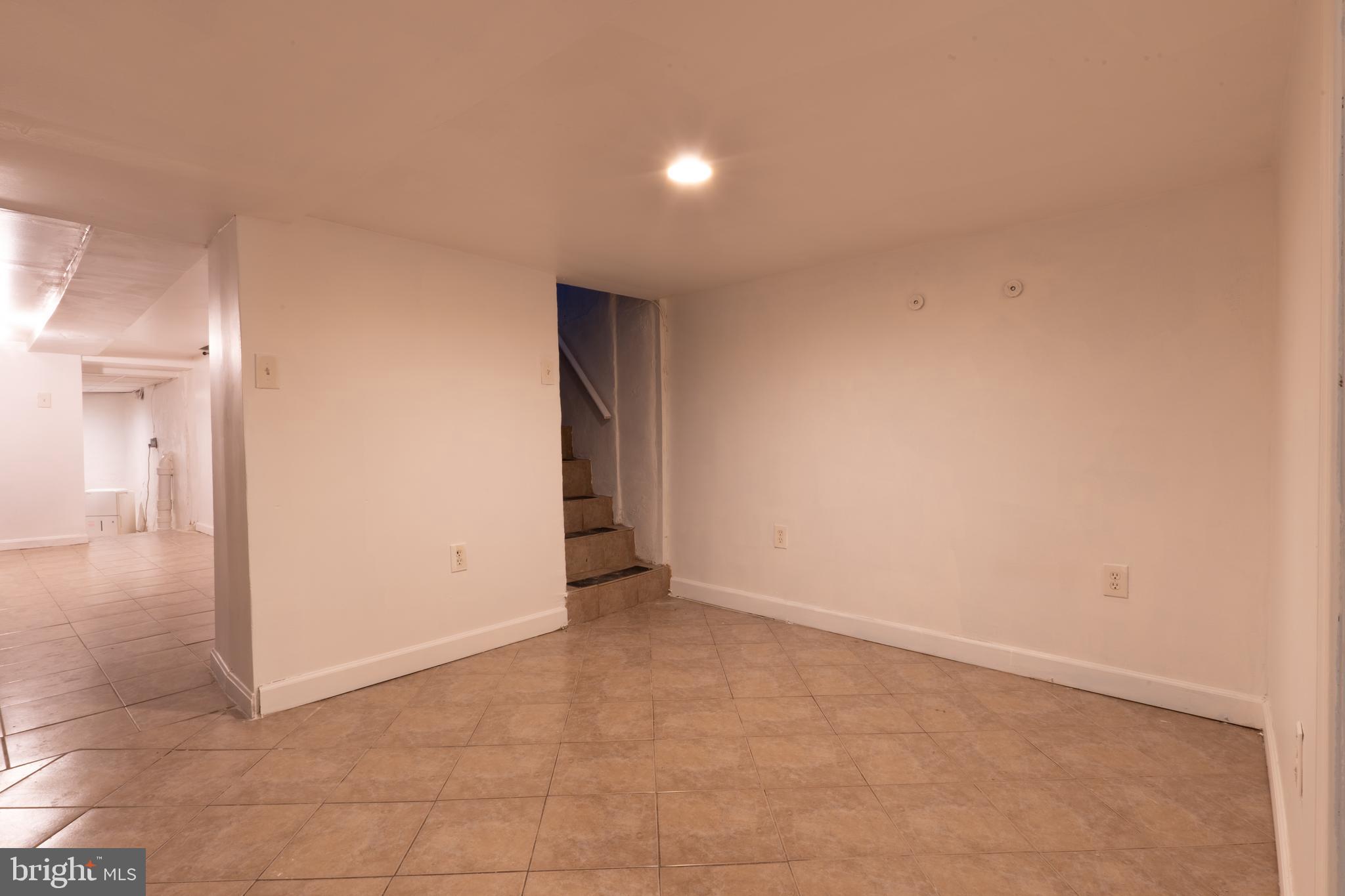 3618 Emerald Street Philadelphia, PA 19134 - Photo 22 of 34 an empty room with a bathroom