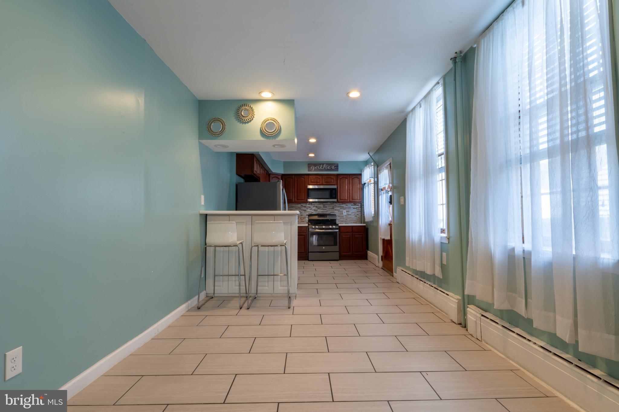 3618 Emerald Street Philadelphia, PA 19134 - Photo 28 of 34 a view of a kitchen with a sink