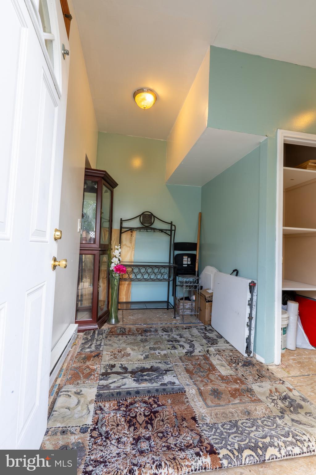 3618 Emerald Street Philadelphia, PA 19134 - Photo 29 of 34 a room with furniture and a flat screen tv