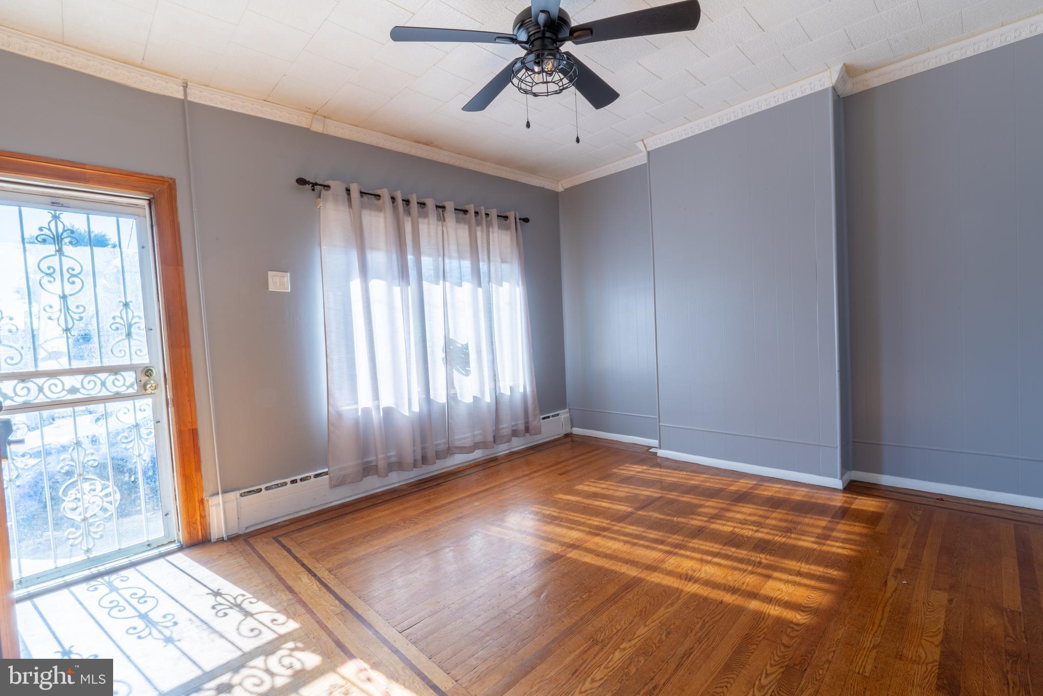 3618 Emerald Street Philadelphia, PA 19134 - Photo 3 of 34 a view of an empty room with a window