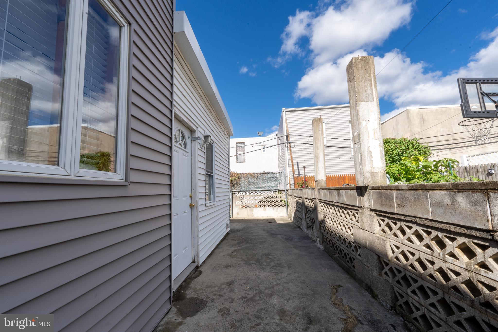 3618 Emerald Street Philadelphia, PA 19134 - Photo 32 of 34 a view of a balcony with wooden fence