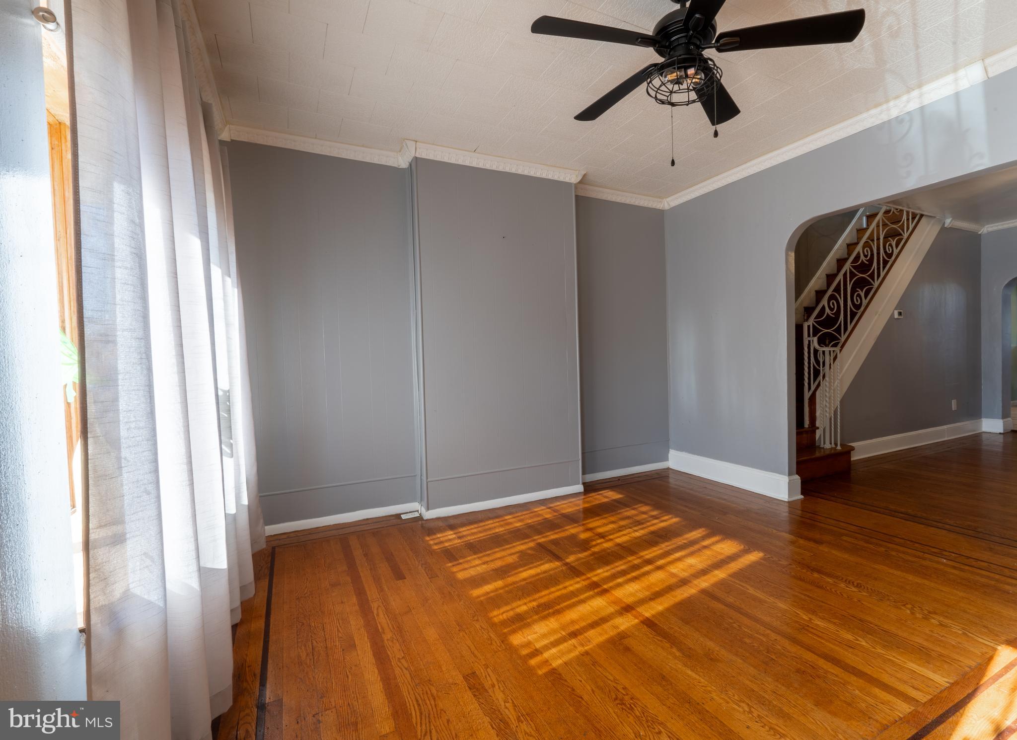 3618 Emerald Street Philadelphia, PA 19134 - Photo 4 of 34 a bedroom with a bed and a window
