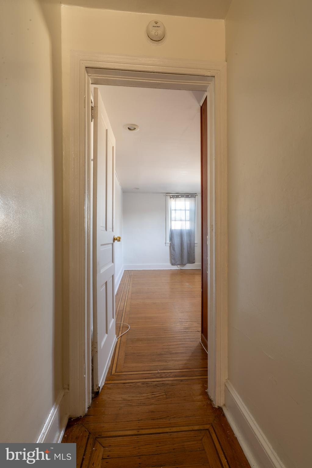 3618 Emerald Street Philadelphia, PA 19134 - Photo 8 of 34 a view of a bathroom from a hallway